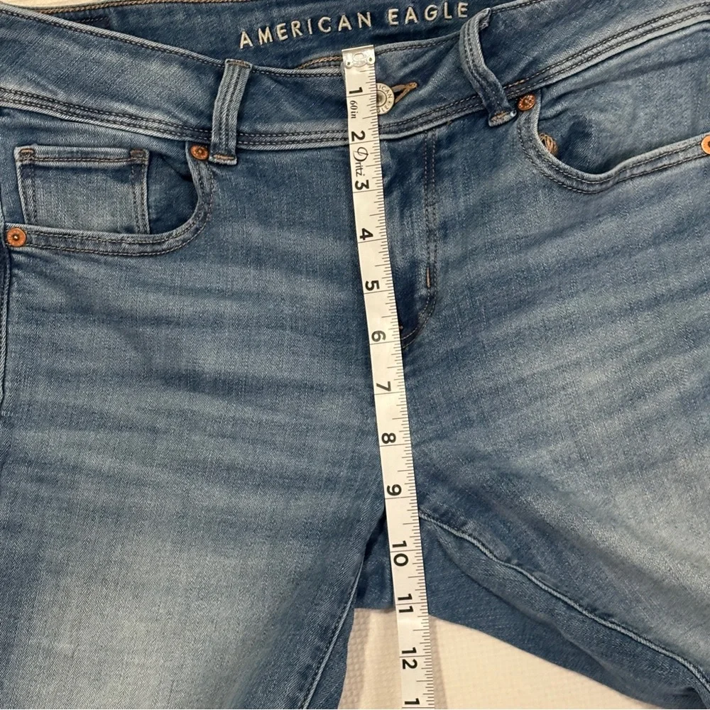 American Eagle Next Level Stretch High Rise Kick Boot Jeans in Light Wash Denim - Picture 9 of 12